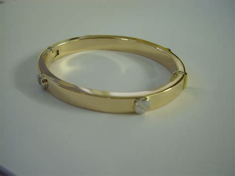 solid gold screw bangle